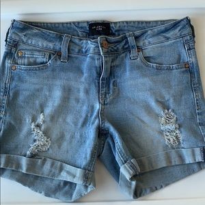 Distressed blue Jean shorts